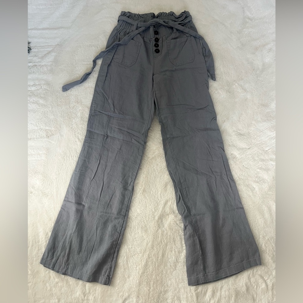 Faded blue. Linen pants.